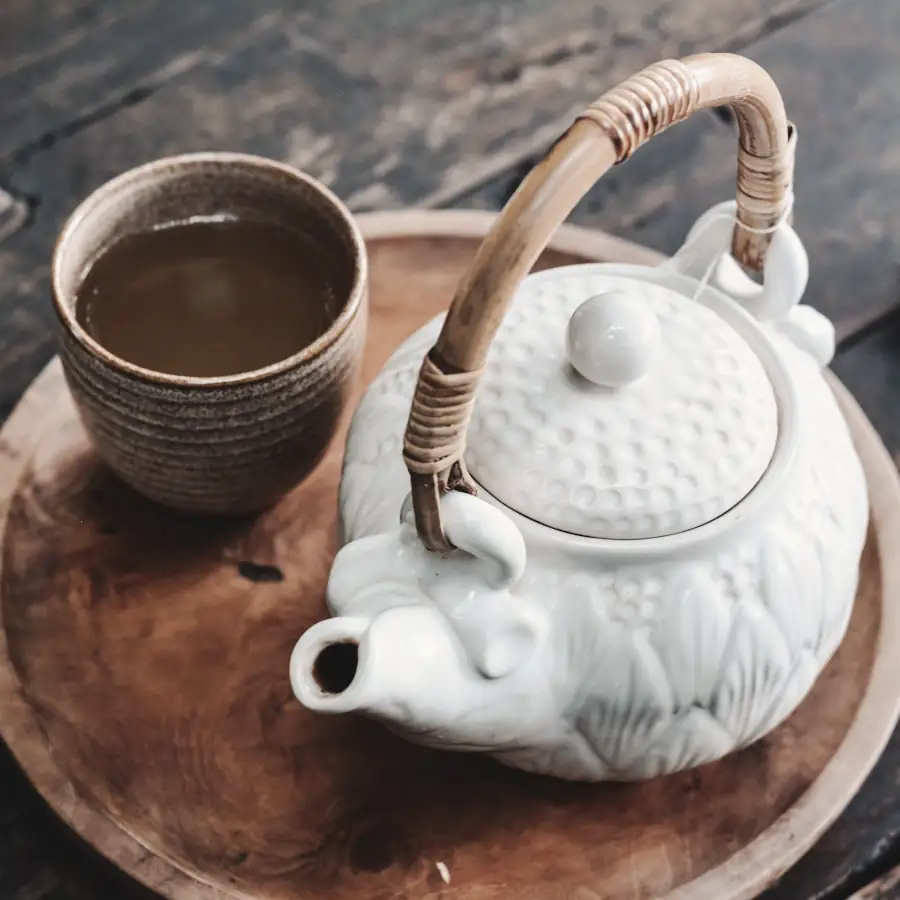 Turkish coffee poured from a long-handled pot